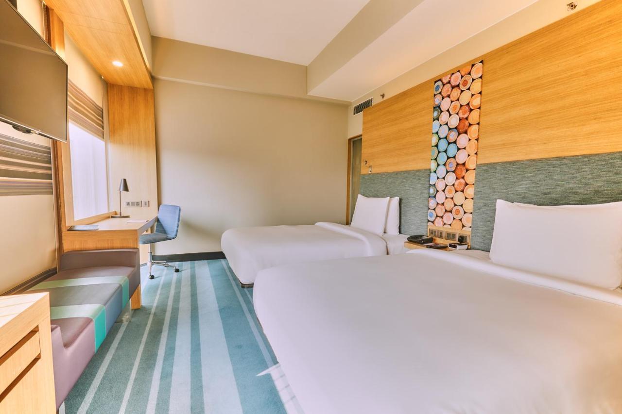Aloft New Delhi Aerocity Buitenkant foto A room at the hotel