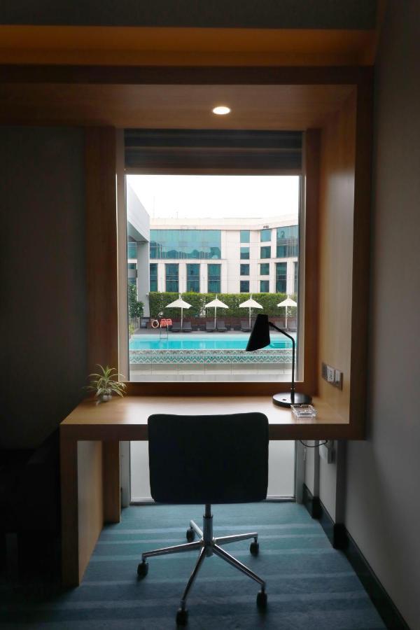 Aloft New Delhi Aerocity Buitenkant foto A room at the hotel