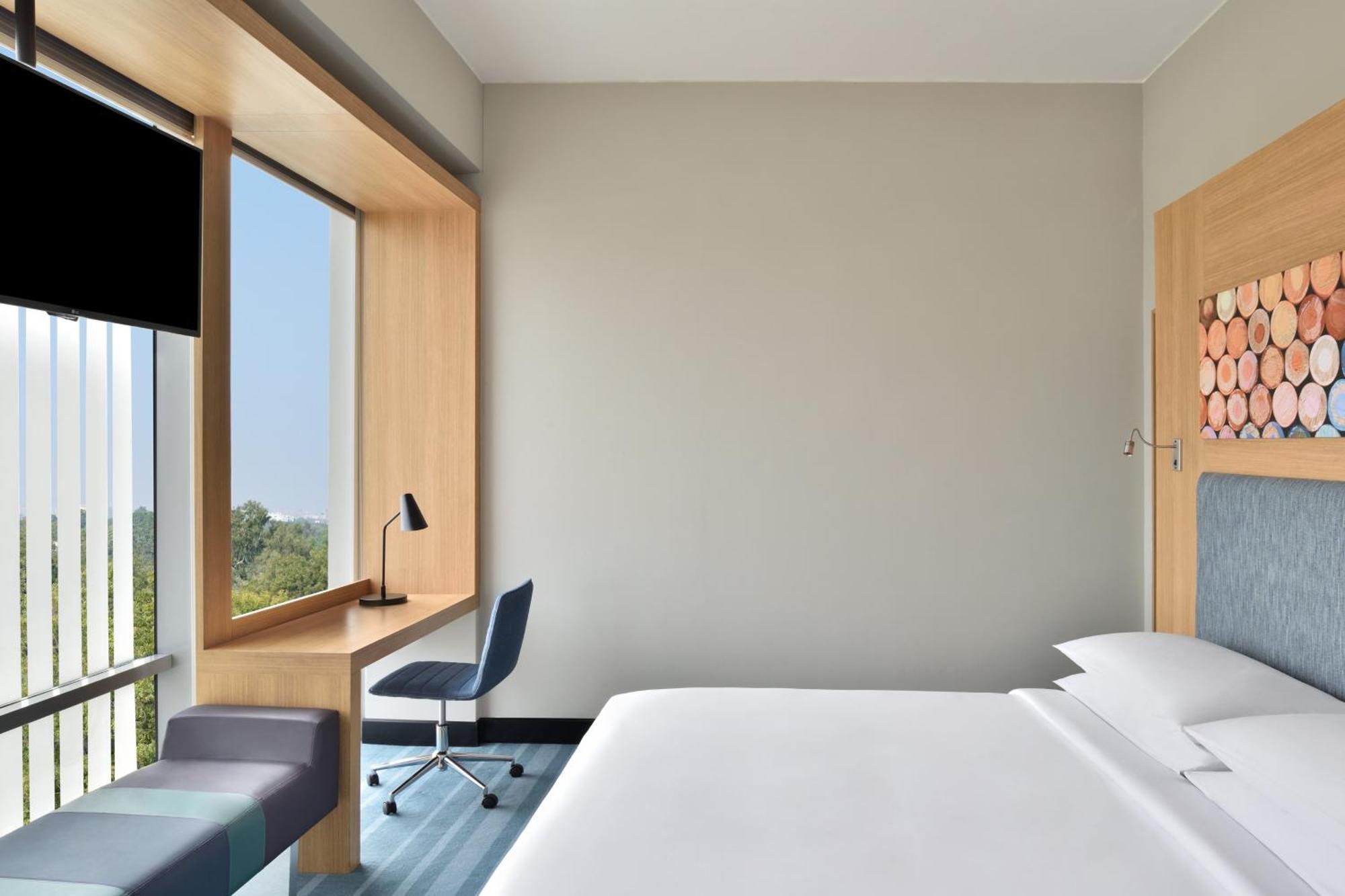 Aloft New Delhi Aerocity Buitenkant foto A room at the hotel